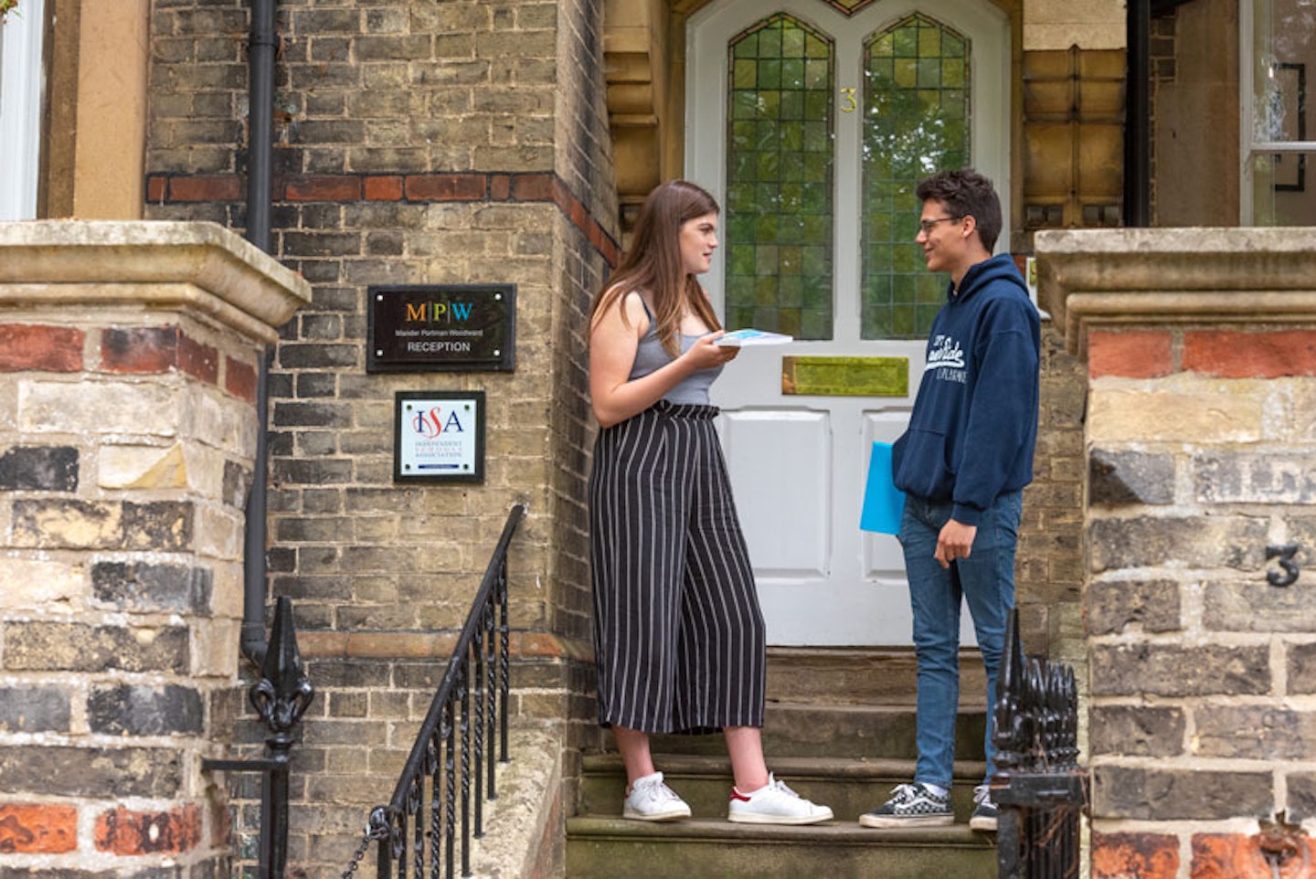 students talking outside MPW Cambridge